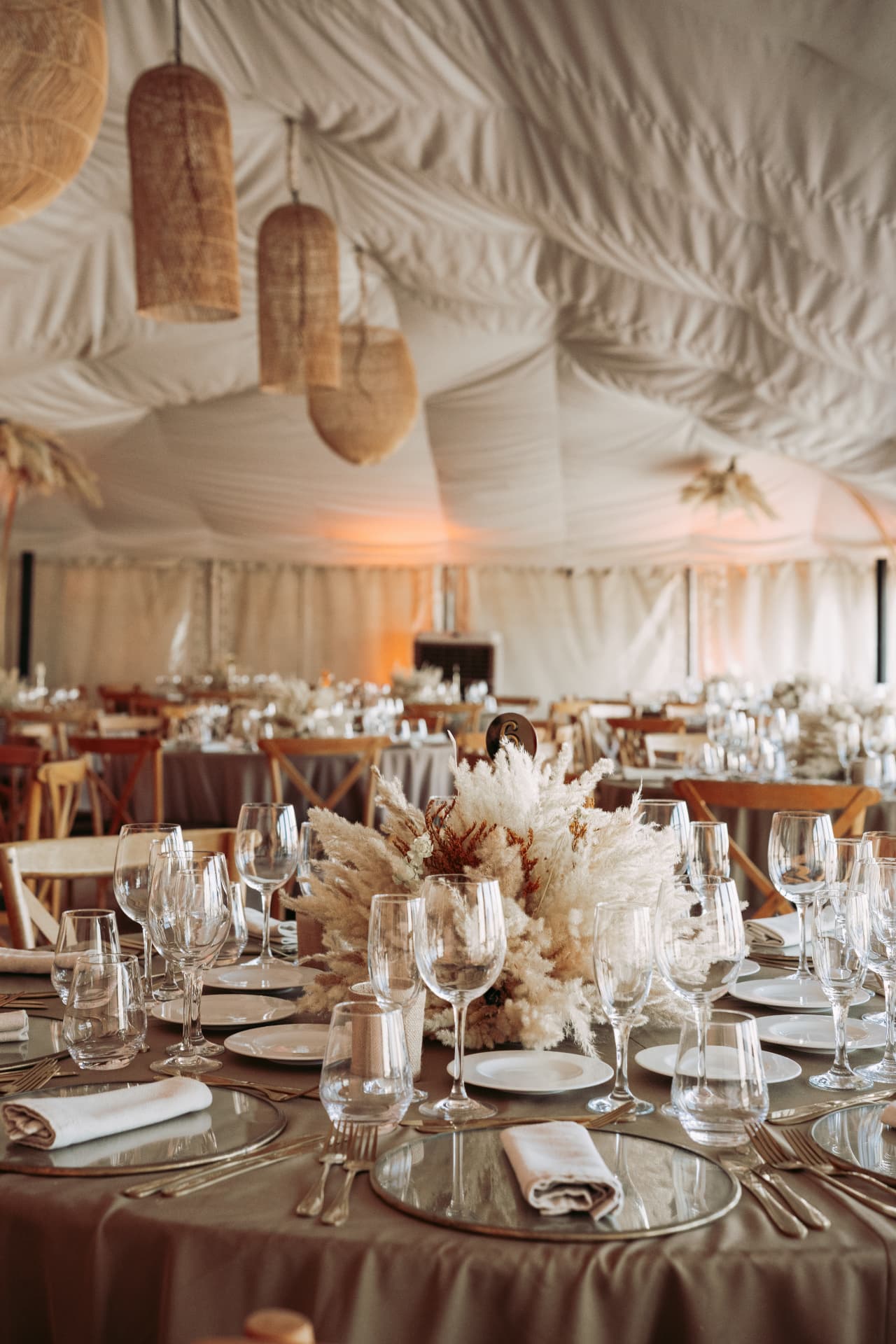 Celebration in the Agafay desert near Marrakech — equestrian performance in red, desert lounges, pampas tablescapes and fireworks, produced by SBAI Events Production